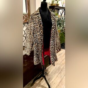 Leopard print trench coat. Button up with hot pink inner lining. Women’s size L